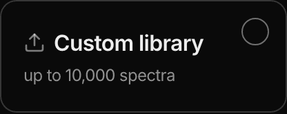 The custom-library chip, offering to search a reference library of your own alongside the deployed ones, with its spectrum cap stated on it.